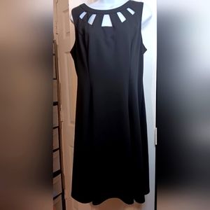 Alyy Peep Hole Black Dress Zipper Back Size 12 Over the knee